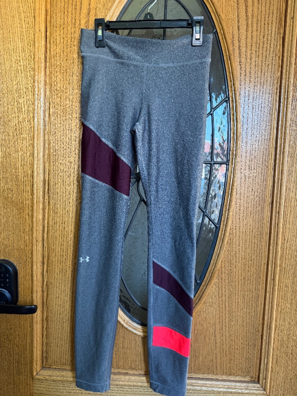 Under Armour grey leggings with pink and purple accents
